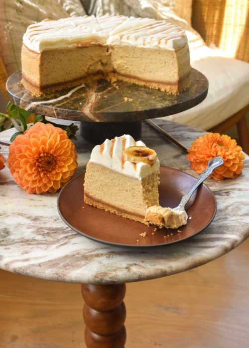 Slice of Banoffee Cheesecake with caramel drizzle